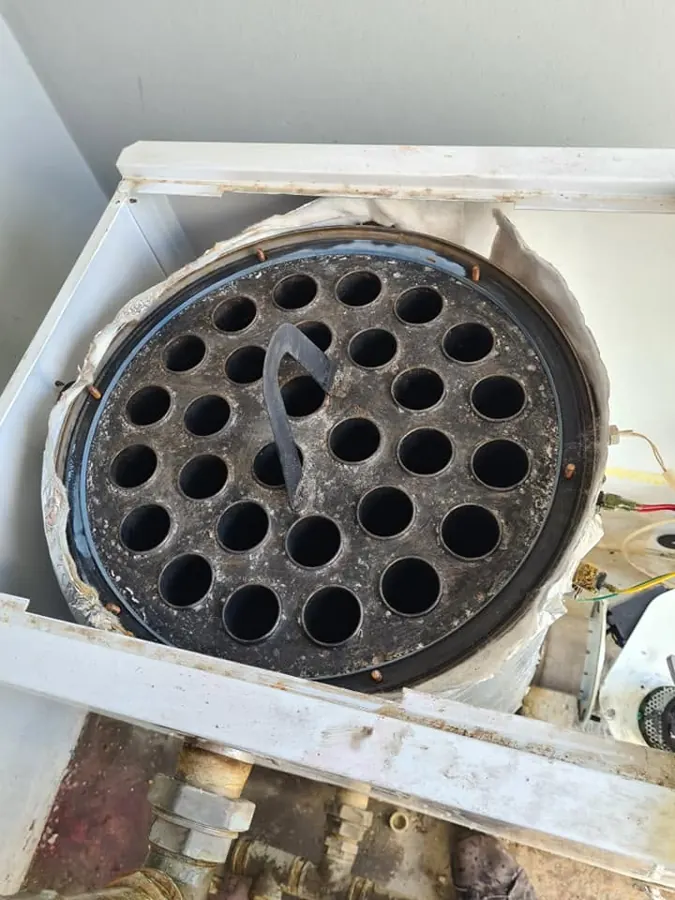 Boiler heat exchanger opened for cleaning